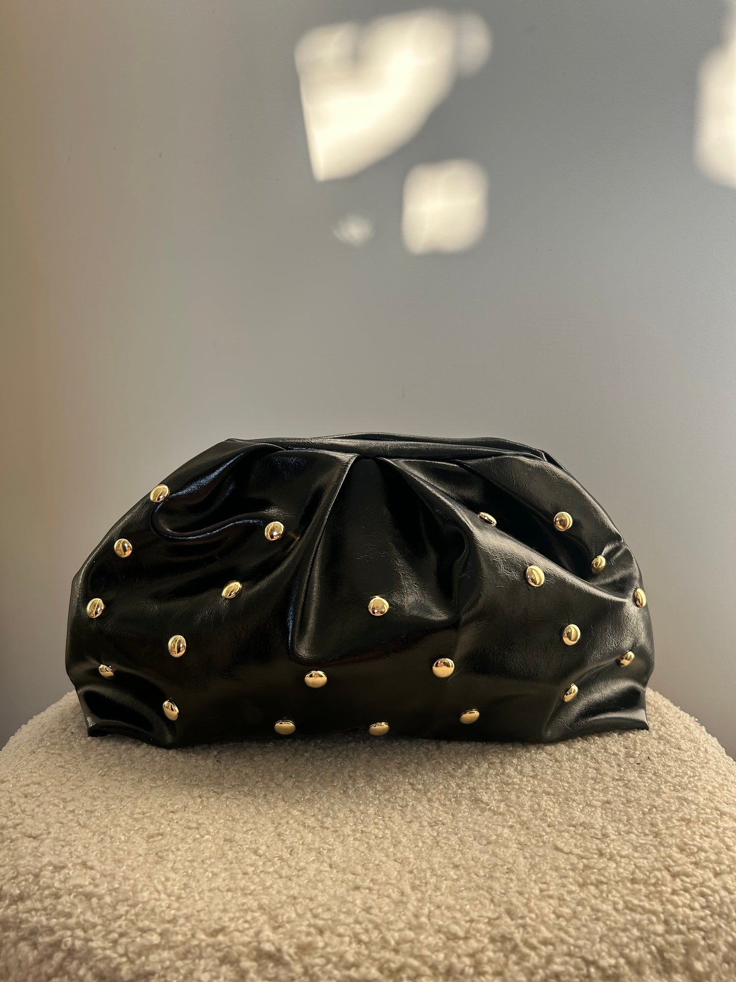 Black studs clutch